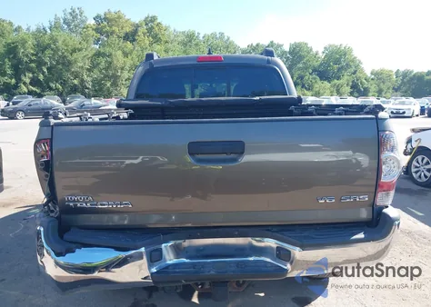 2014 Toyota Tacoma Base V6 z USA, uszkodzony, nr VIN 3TMLU4EN0EM144133